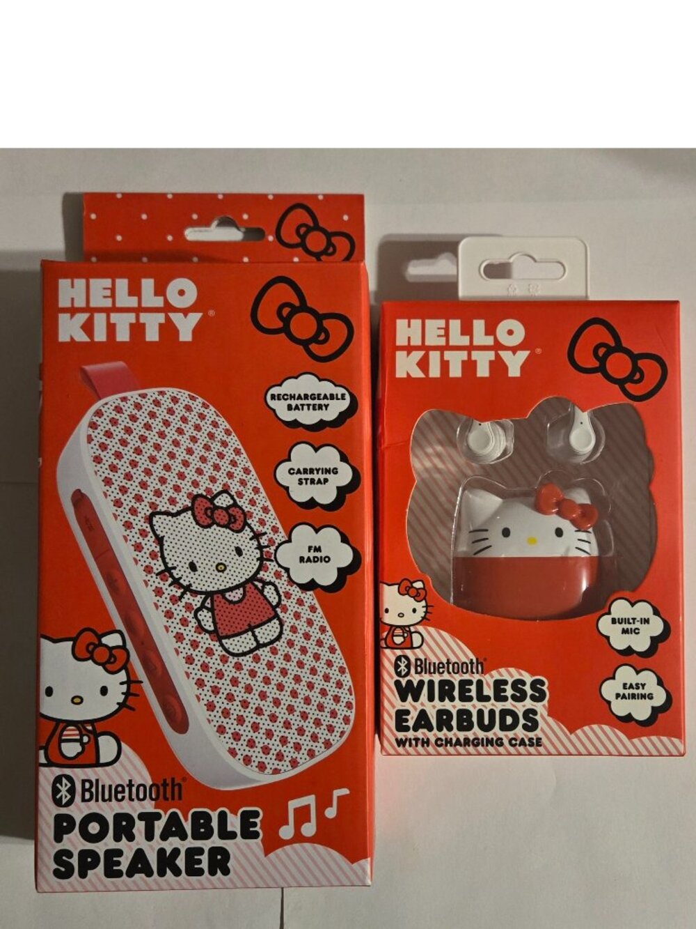 New In Box Hello Kitty Portable Bluetooth Speaker and wireless Earbuds